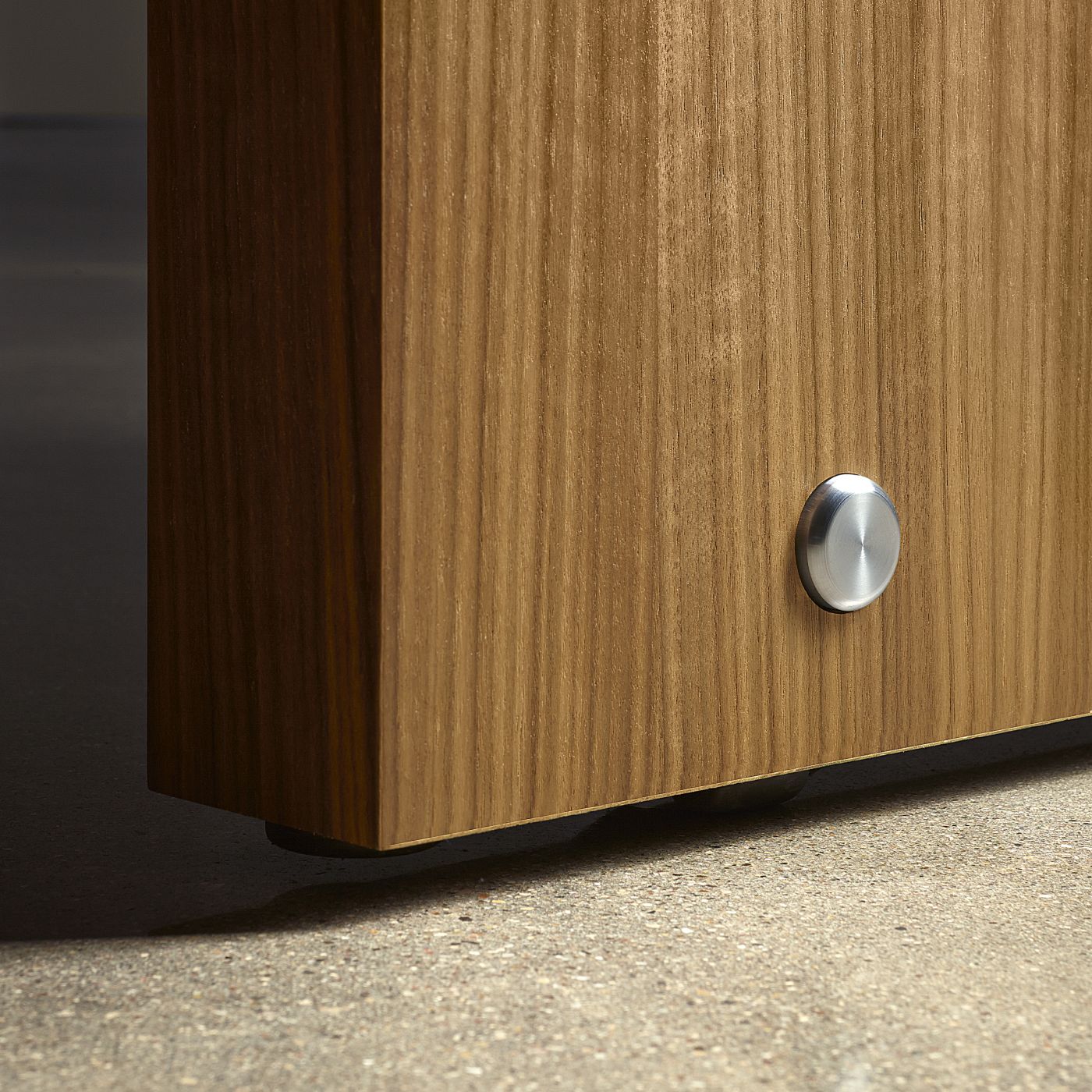 Stainless steel pins subtly express innovative, integral casters.