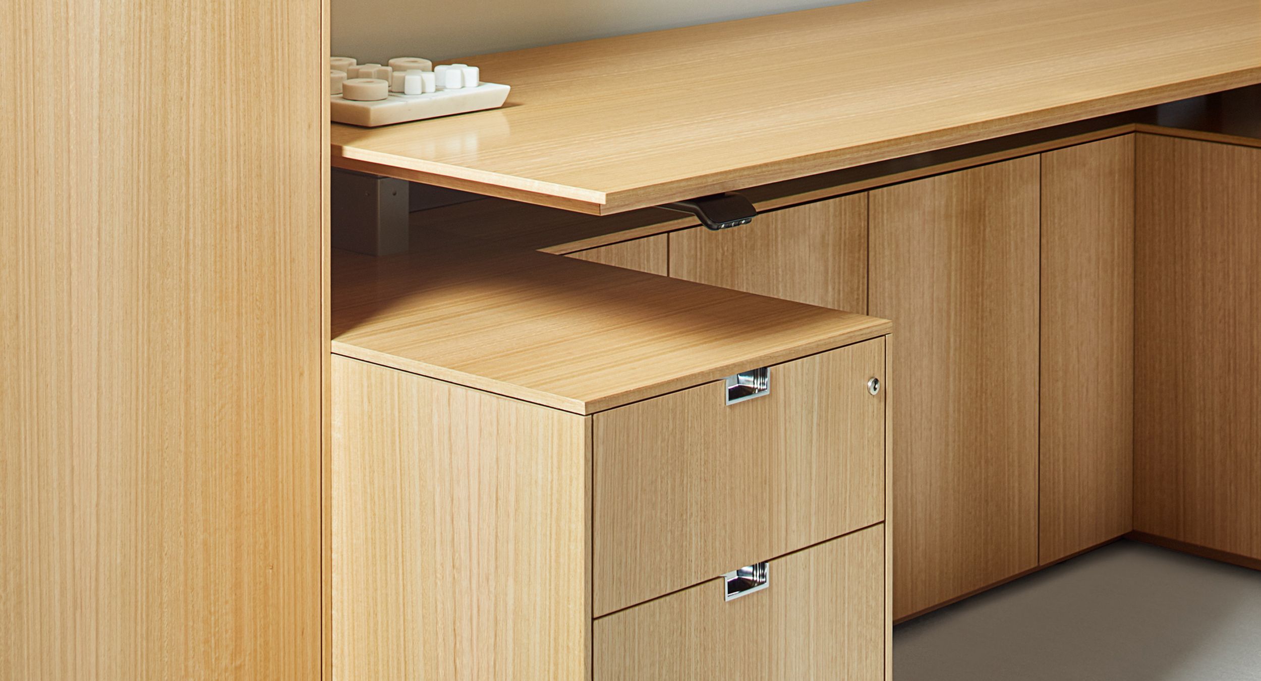 Adjustable-height surfaces fully integrate into Lex solutions.