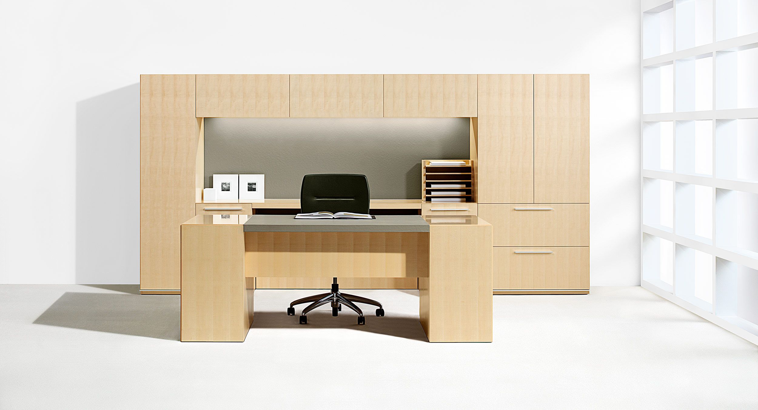 Freestanding desks pair perfectly with minimalist Mitre workwalls.
