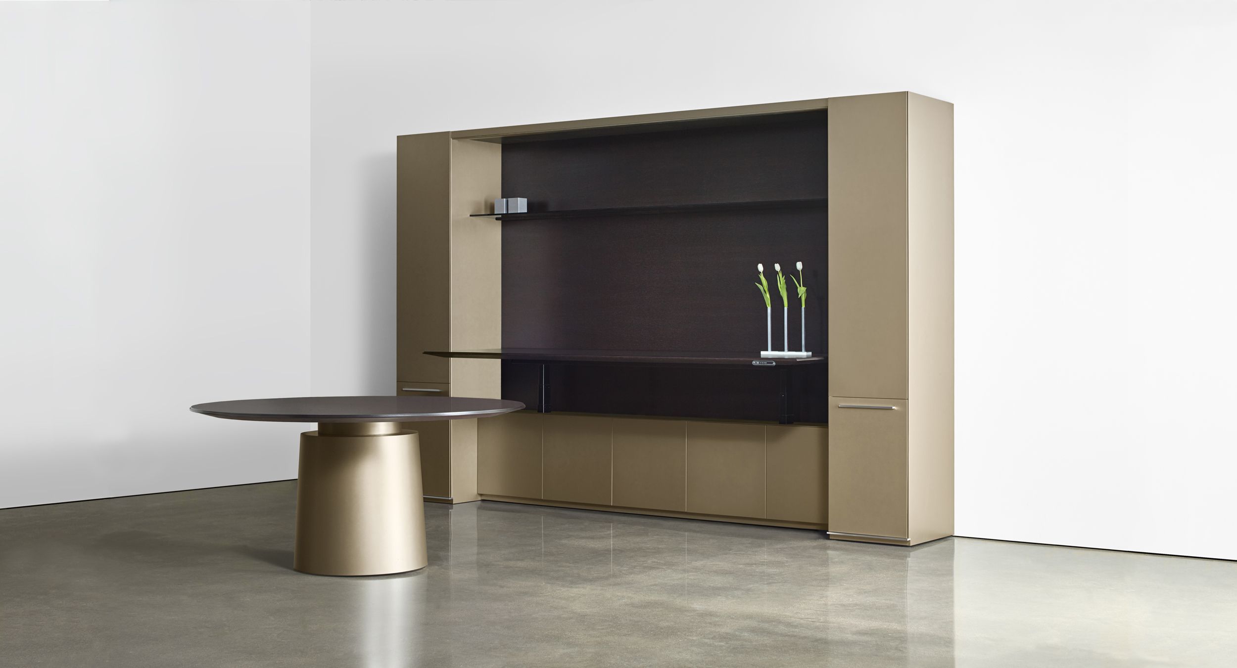 An integral adjustable-height surface demonstrates attention to detail and elegance in execution.