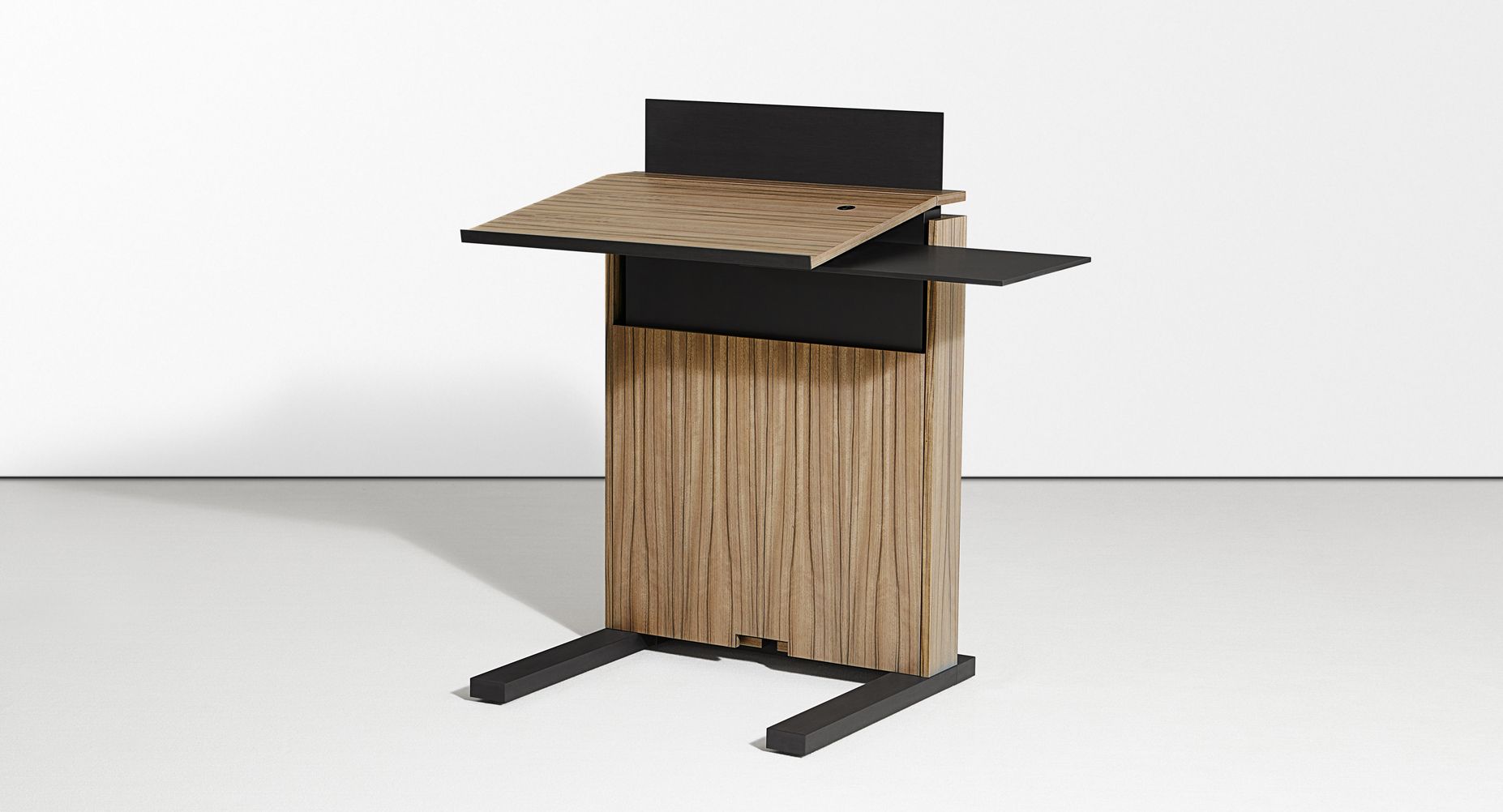The adjustable-height mobile lectern is available with an optional swivel shelf.