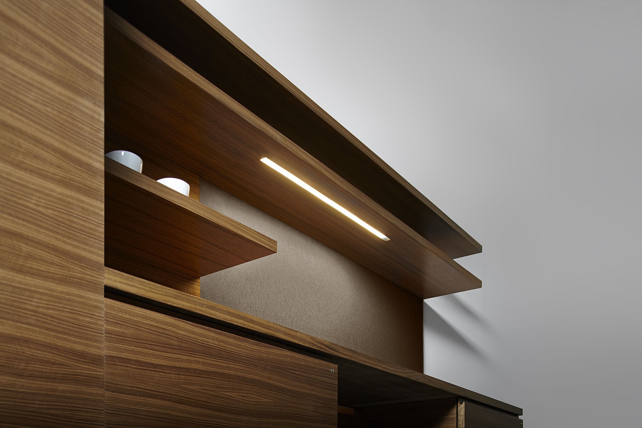 Integral recessed LED lighting is available for continuous floating shelves.