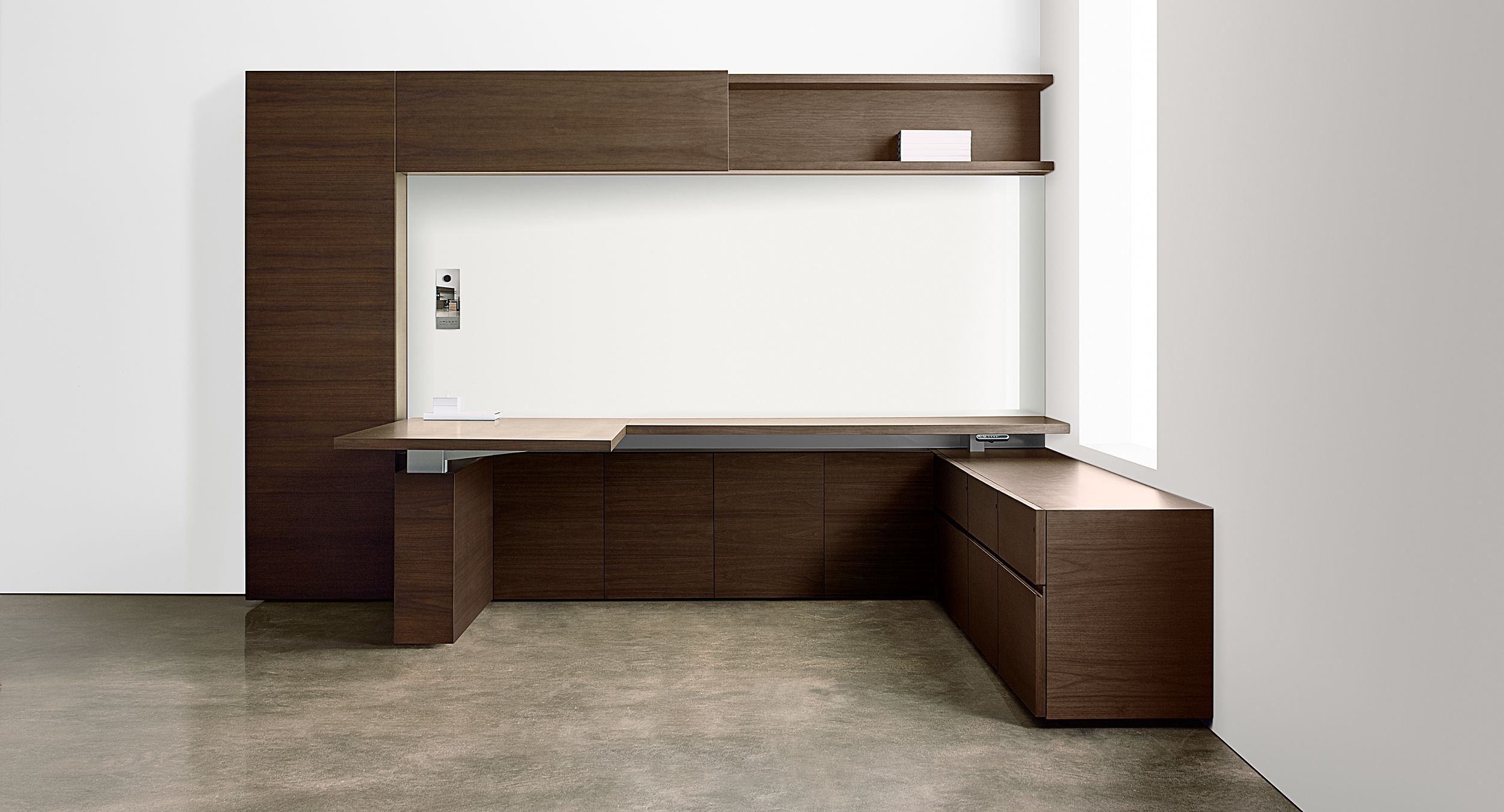 Adjustable-height desking seamlessly integrates into the timeless modern design.