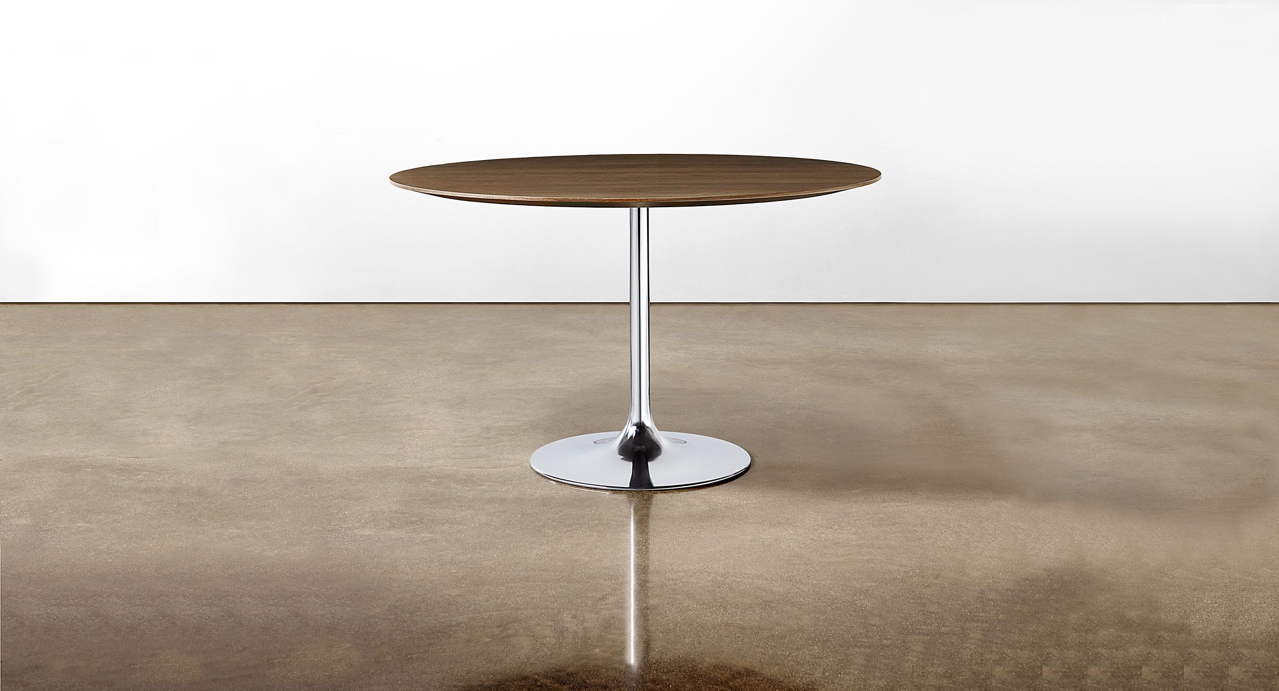 Sessions table with sculptural Trumpet base