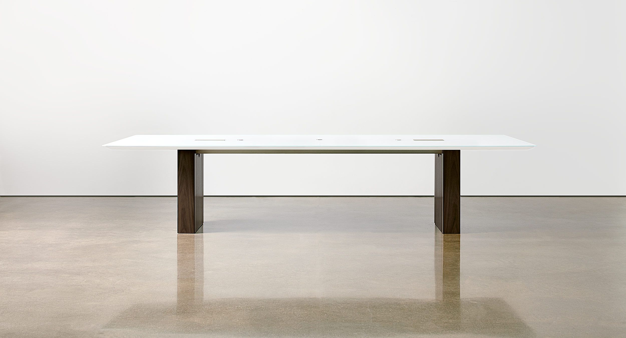 Rectangular glass table with Panel base