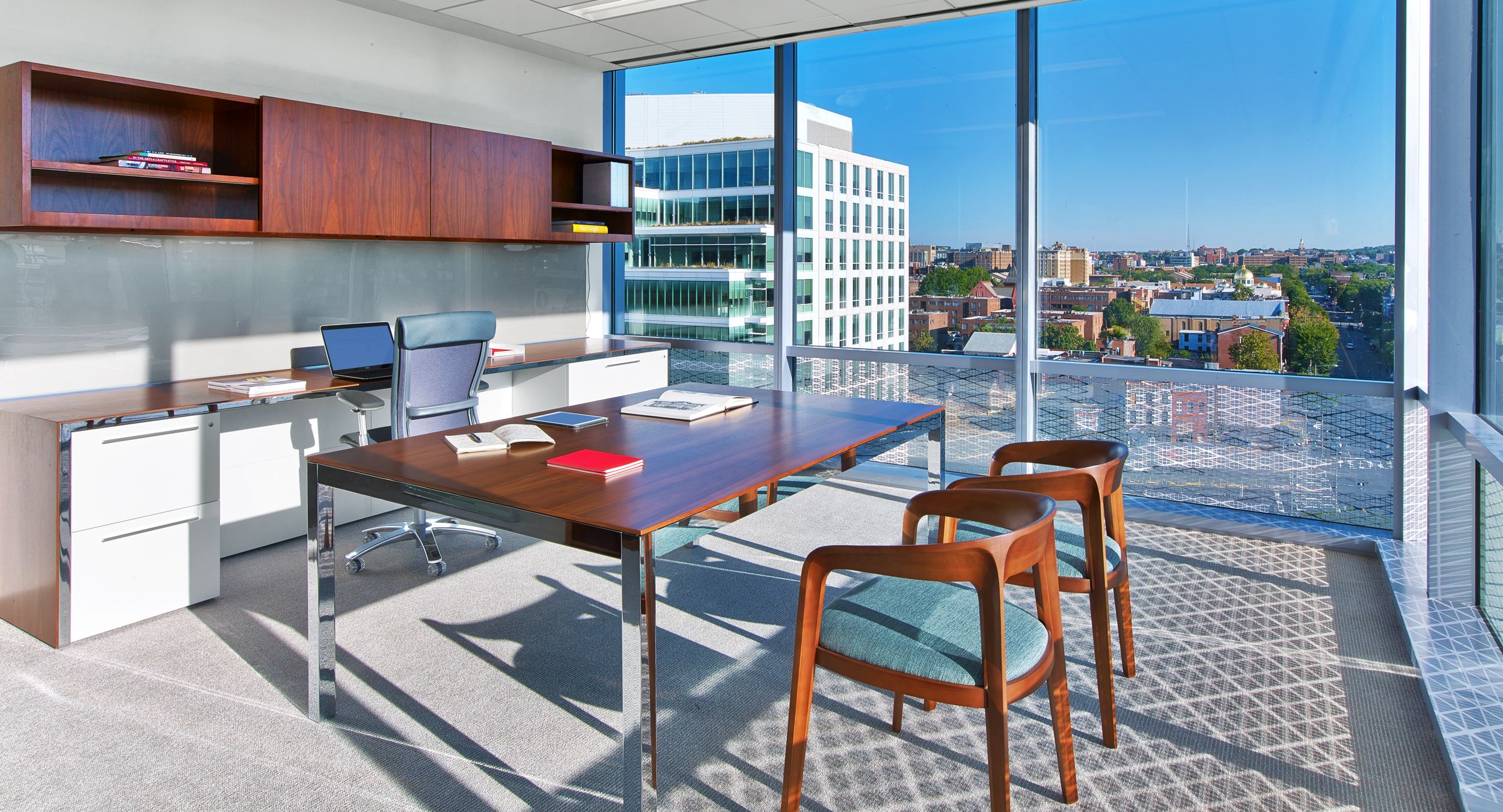 A minimal LEX desk pairs beautifully with the custom-designed workwall.