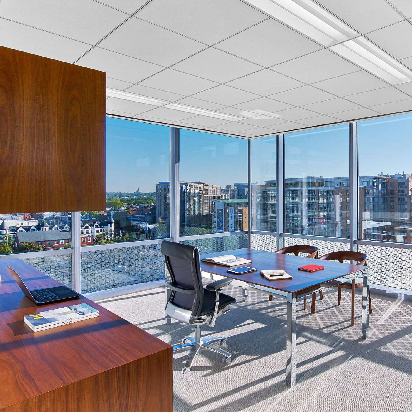 A corner office exudes modern sophistication.