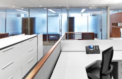 Workstations feature a full range of materials with walnut veneers, laminate, chrome, fabric, etched glass, and stone. thumbnail