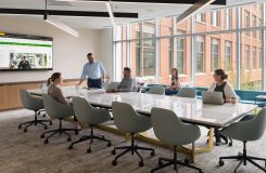 This meeting space features HALO gallery seating and a HALO table in stone and brushed brass. thumbnail