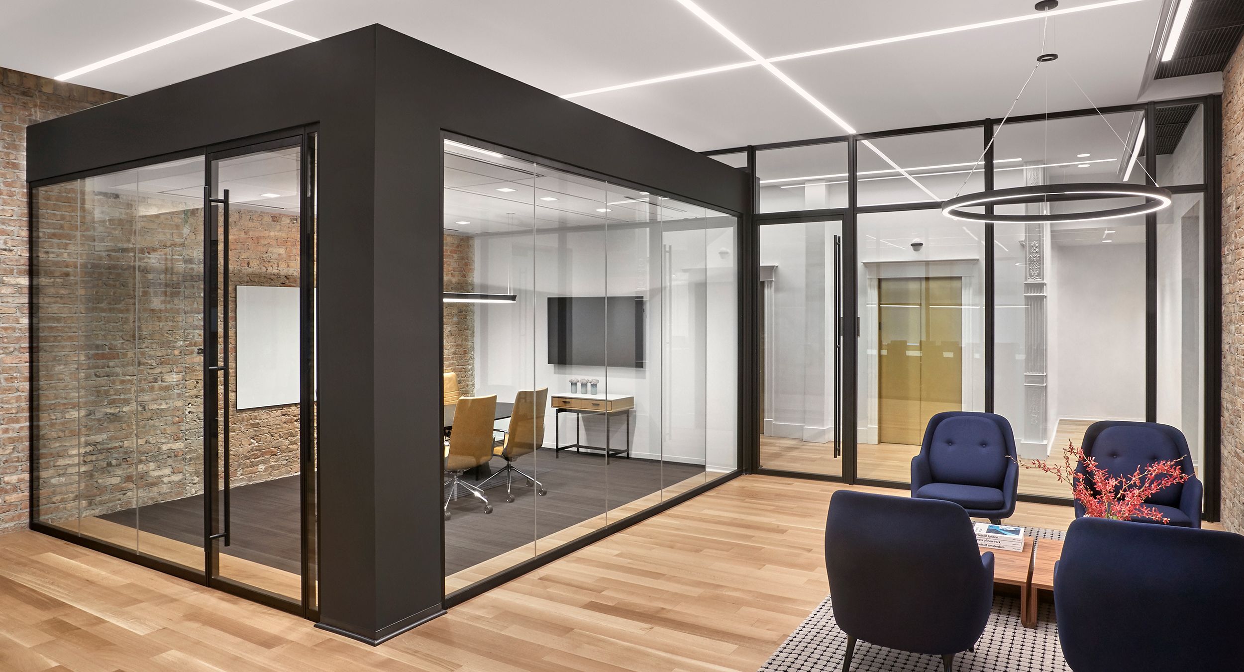 HALO tables and sideboards are used throughout the firm's modern meeting spaces.