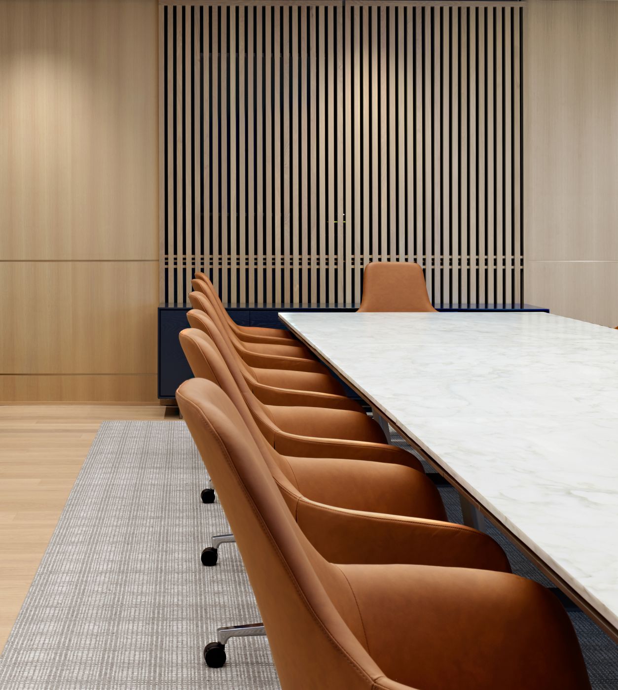 MESA conference table and custom HALO sideboard mesh perfectly with the client's clean and modern design scheme.