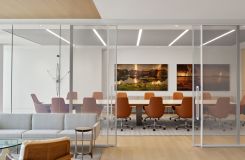 MESA conference table in stone and light bronze , and custom HALO credenza are elegant centerpieces for this space. thumbnail