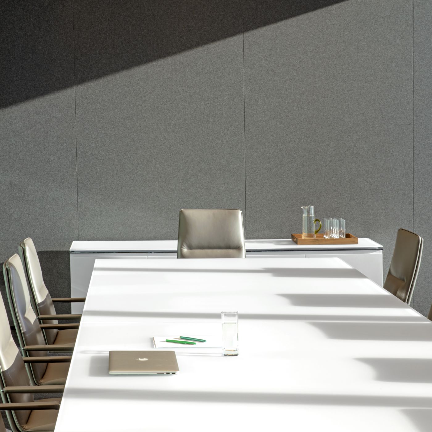 MESA conference table and signature credenza with etched-glass surfaces.