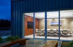 Our main conference room features a MESA table with a custom integrated media wall in Figured Walnut. thumbnail