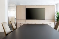 The Weathered Hickory media wall and HALO credenza with Taj Mahal marble are both beautiful and functional. thumbnail