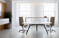 A STRATOS table in Designer White Corian and Bronze anchors the space  with a LEX floating credenza and bar-height HUGO table as perfect complements. thumbnail