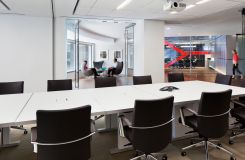MOTUS tables in etched white glass create conference space that is beautiful and flexible. thumbnail
