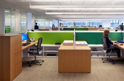 Each workstation cleanly integrates multiple storage options with glass, whiteboards, and tackable fabric to create a bright, beautiful, and functional open plan solution. thumbnail