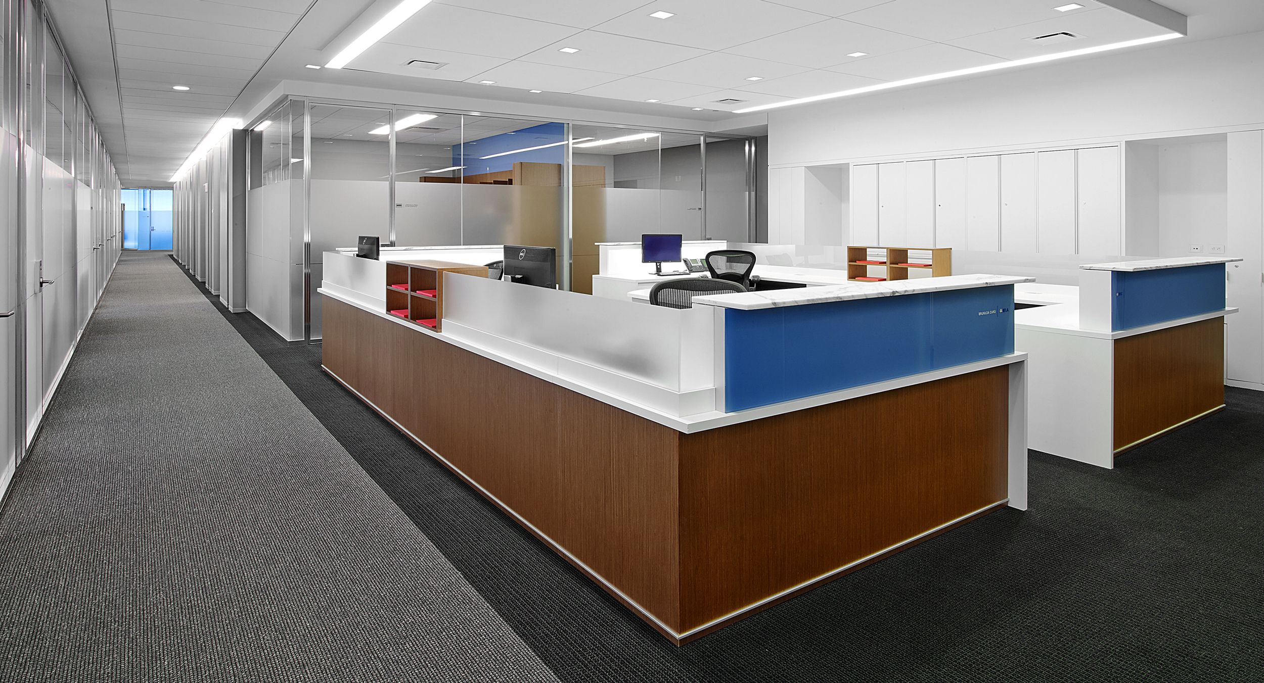 Administrative stations integrate a wide variety of materials:  Stone, tinted glass, acrylic, veneer, laminate, and satin aluminum.