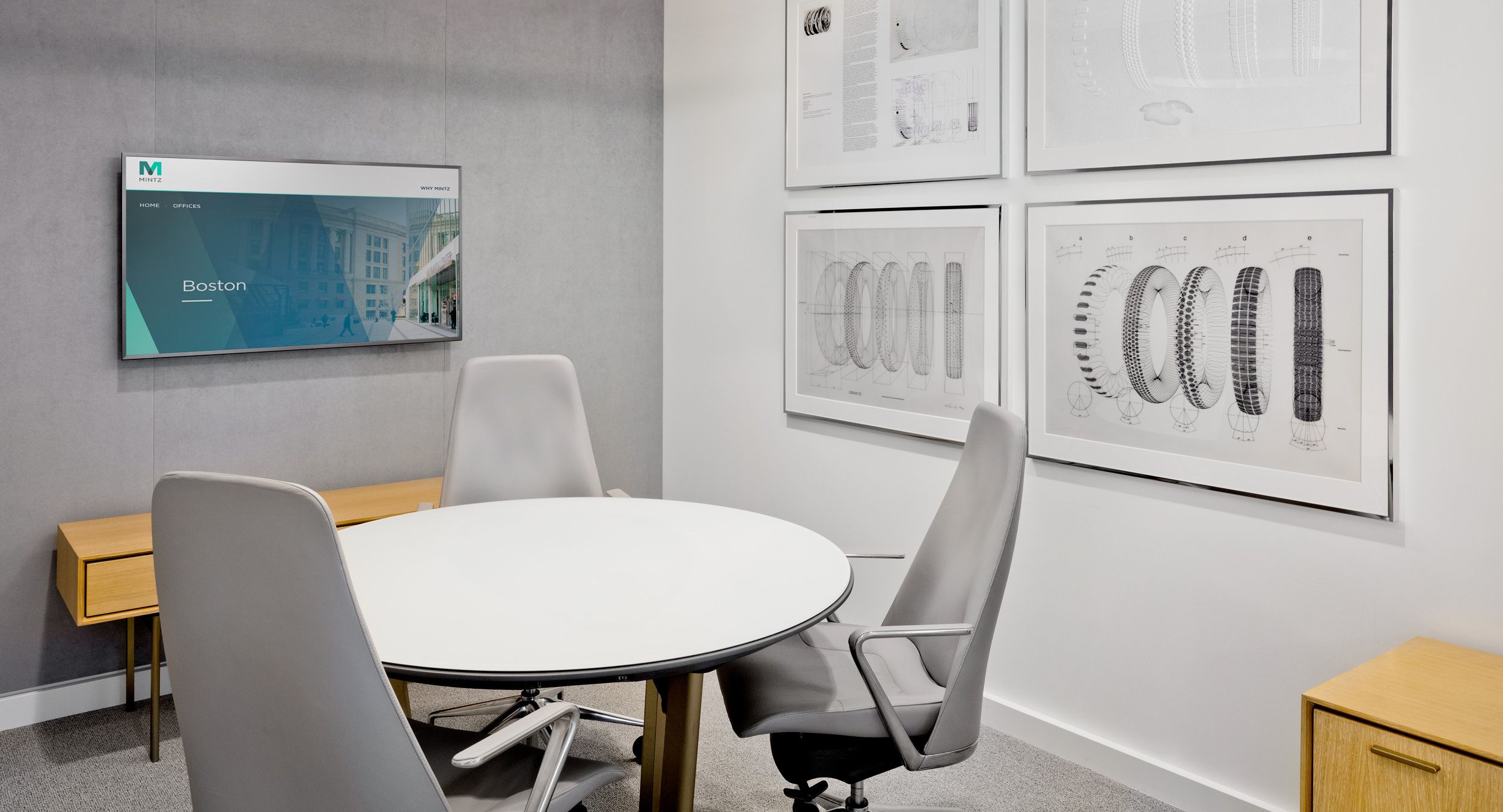 HALO table with custom acid-etched glass surface and custom Y-base finish. A pair of cerused oak HALO credenzas complete the space.