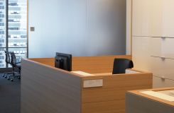 Custom secretarial stations feature Cerused Oak surrounds and high gloss white Parapan file fronts. thumbnail