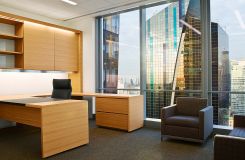 Offices incorporate cerused oak veneers, sliding doors, metal detailing, and integrated lighting.  thumbnail