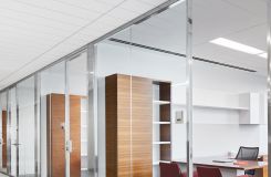 NEW MILLENNIA private offices feature a mix of open and closed storage in grain-matched Quarter Cut Walnut and White. thumbnail