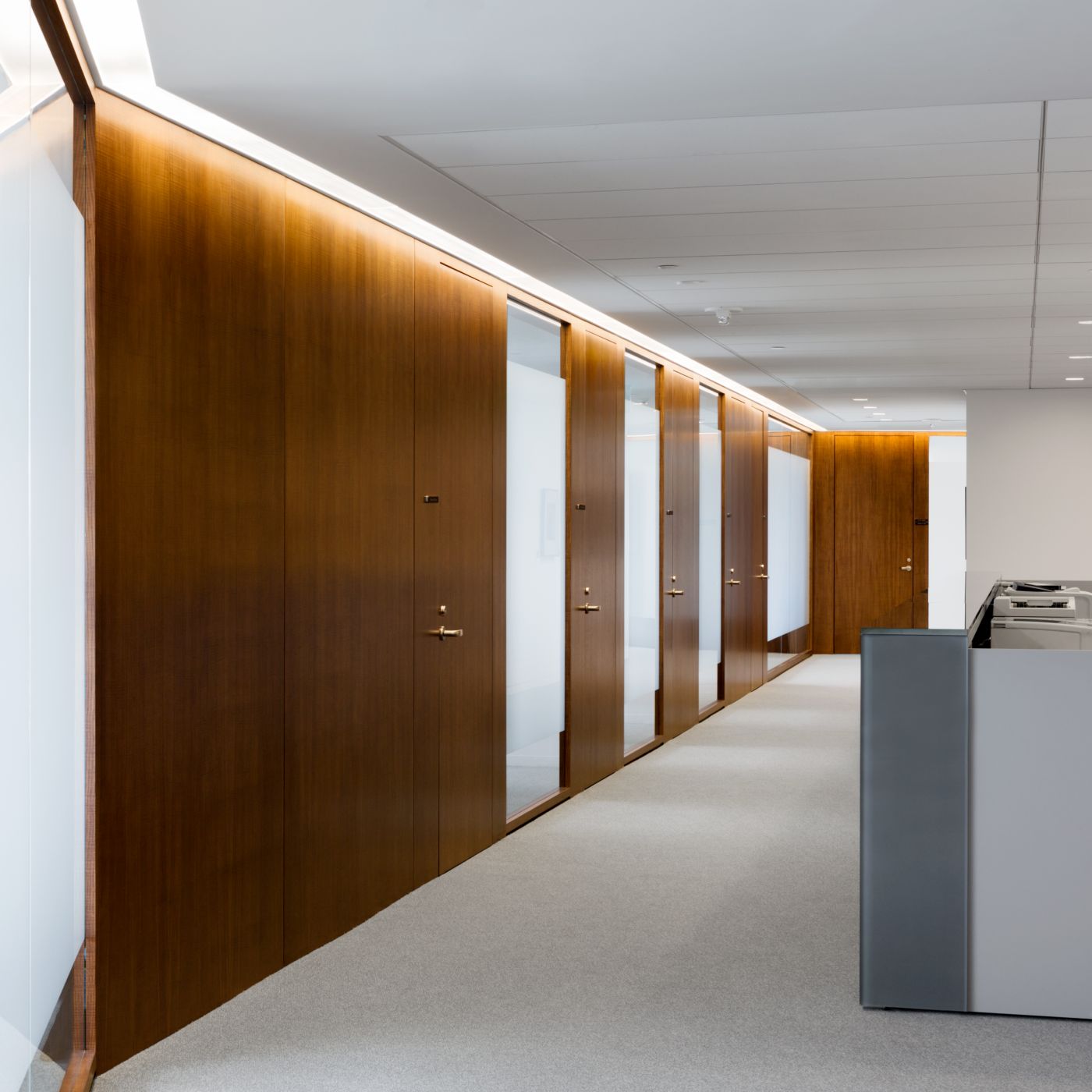 HALCON also provided custom-designed administrative stations in glass and laminate.
