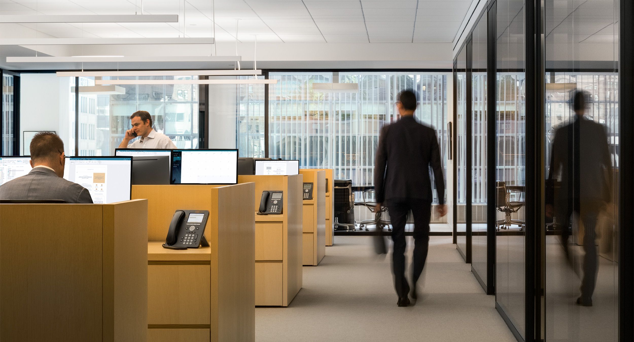 NEW MILLENNIA open workstations enhance collaboration while preserving individual space.
